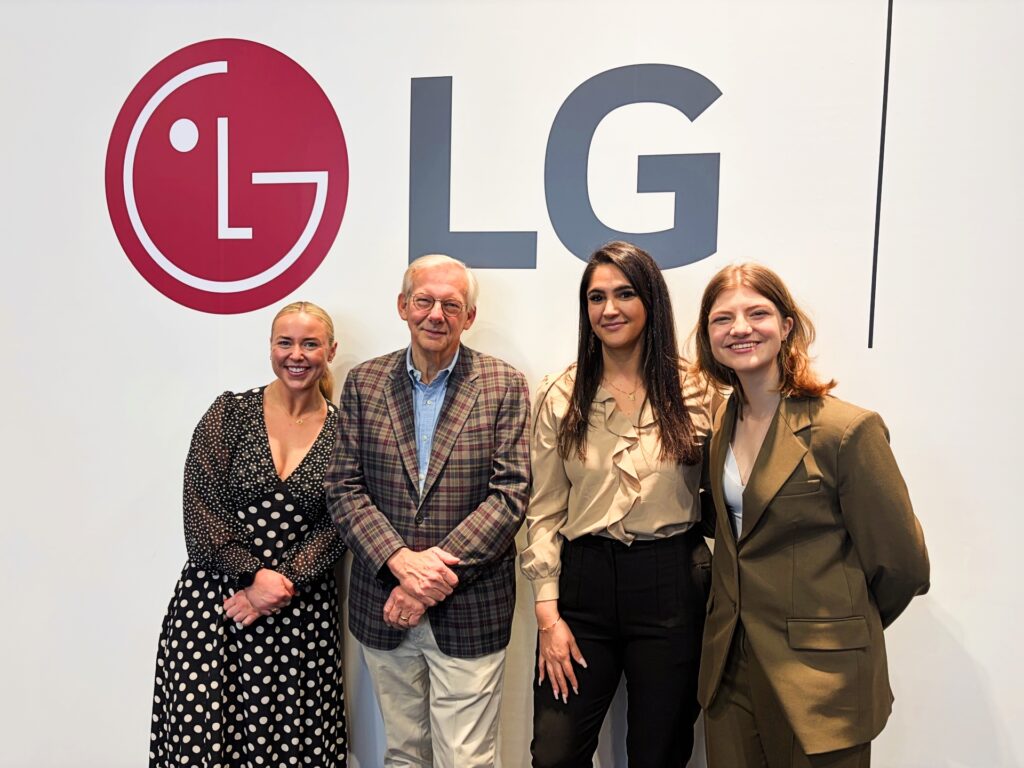Leah McInerney and colleagues with LG Electronics team members at KBIS 2026 in front of the LG logo.