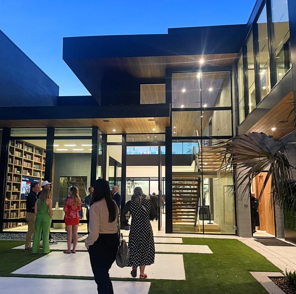 Guests touring The New American Home 2026 during KBIS and IBS, showcasing modern healthy home design and performance-driven building materials.