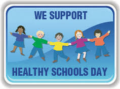 Children holding hands with “We Support Healthy Schools Day” banner highlighting the importance of healthy school environments for National Healthy Schools Day